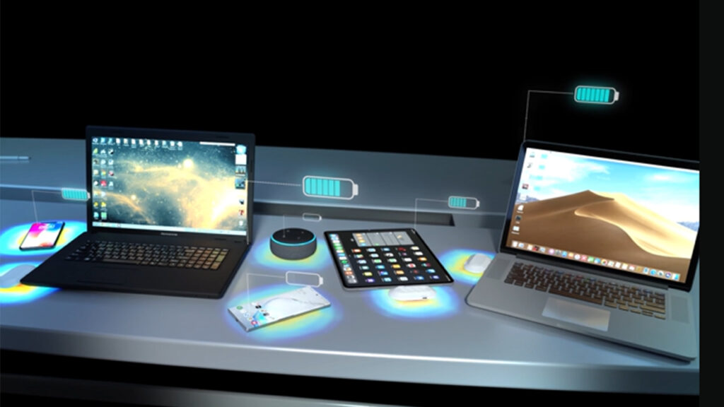 A photo of devices charging on a desktop surface, with graphics showing the flow of energy.