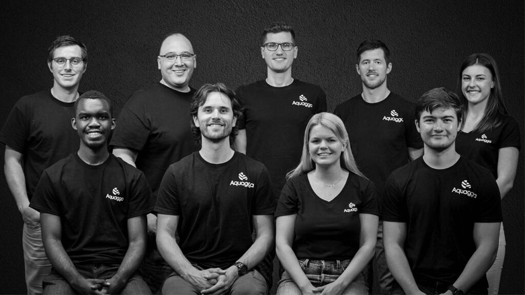 A black and white photo of the Aquagga team.