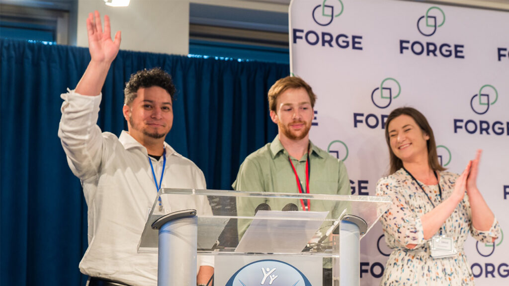CADSPARC Jonathan Aguilar (left) celebrating an award at the FORGE Spring Startup Showcase.