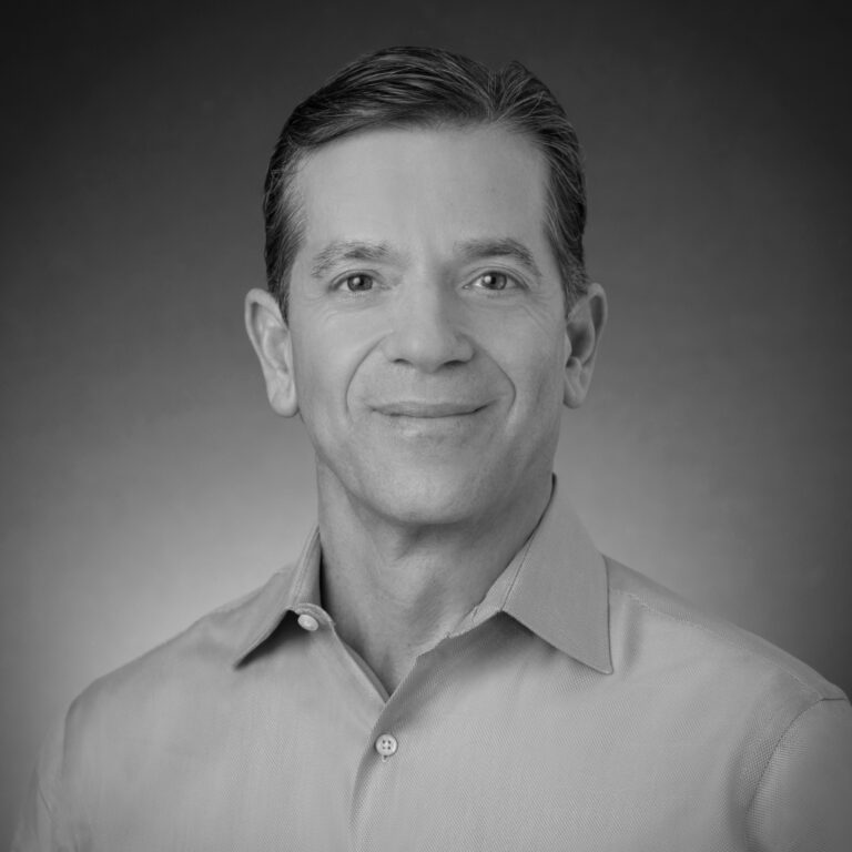 A headshot of Ron Angelo