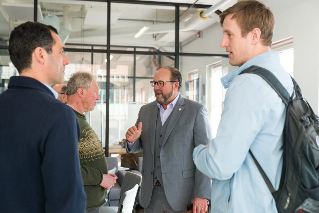 Paul Lavoie and others networking Networking at the ClimateHaven and FORGE Rocket Pitch event