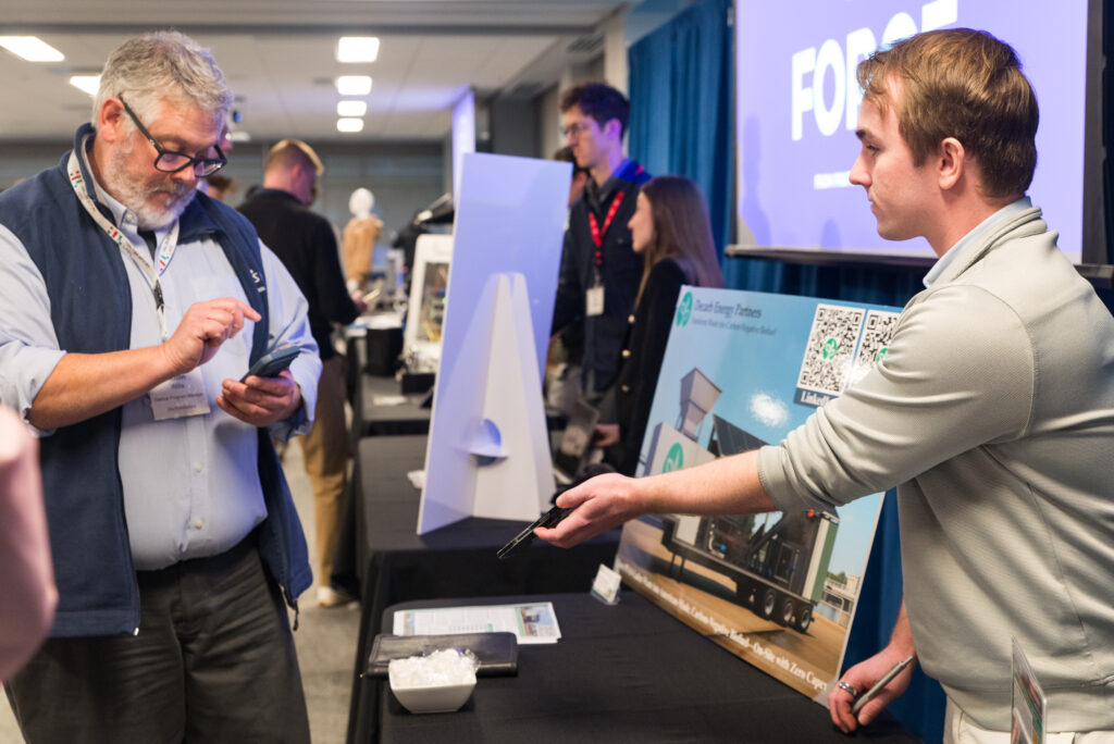 Decarb Energy Partners table at the FORGE Fall Startup Showcase
