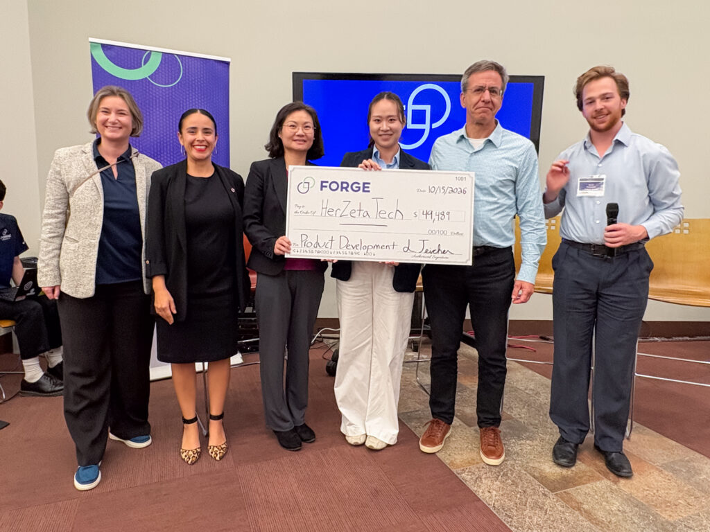 HerZeta Tech FORGE Product Development Grant check award with Eastern Bank