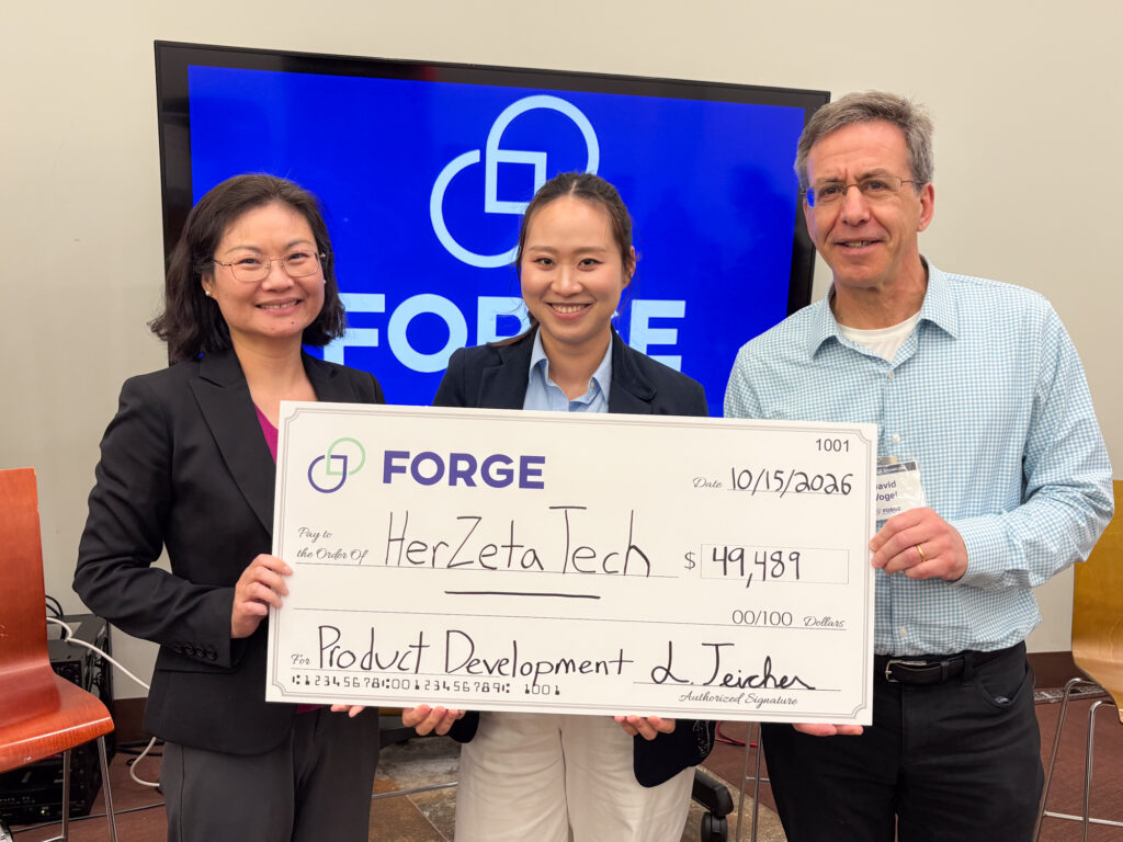 HerZeta Tech FORGE Product Development Grant check award with Eastern Bank
